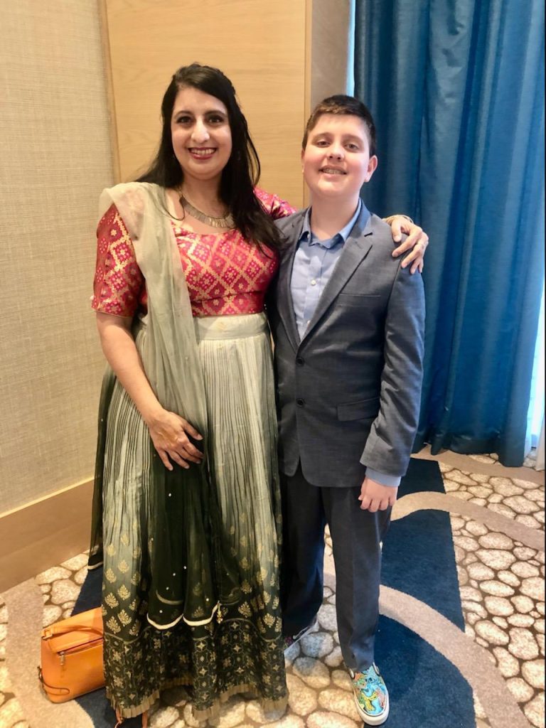 Woman and child dressed up in a Pakistani lehenga and suite